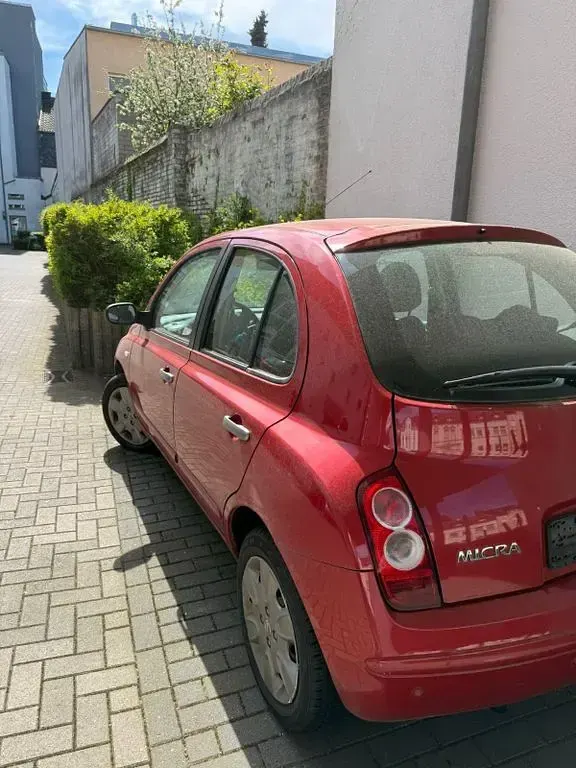 Gebraucht Nissan Micra 65 PS (47 kW) 2009 Rot Limousine