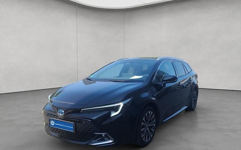 Mysticschwarz mica Gebraucht 2023 Toyota Corolla Team Kombi | 26.830 € (Fairer Preis) - Bild 1/4