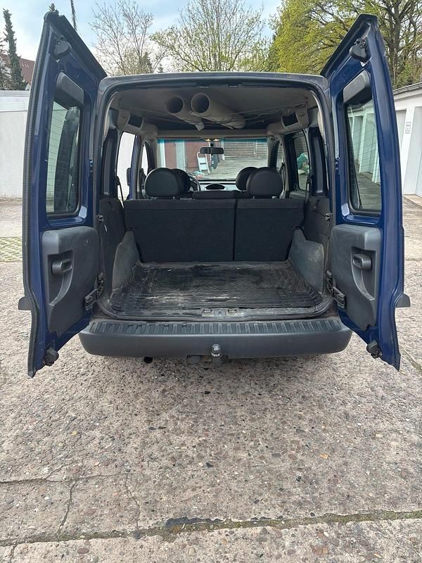 Używany Opel Combo 90 KM (66 kW) 2011 Niebieski Minivan