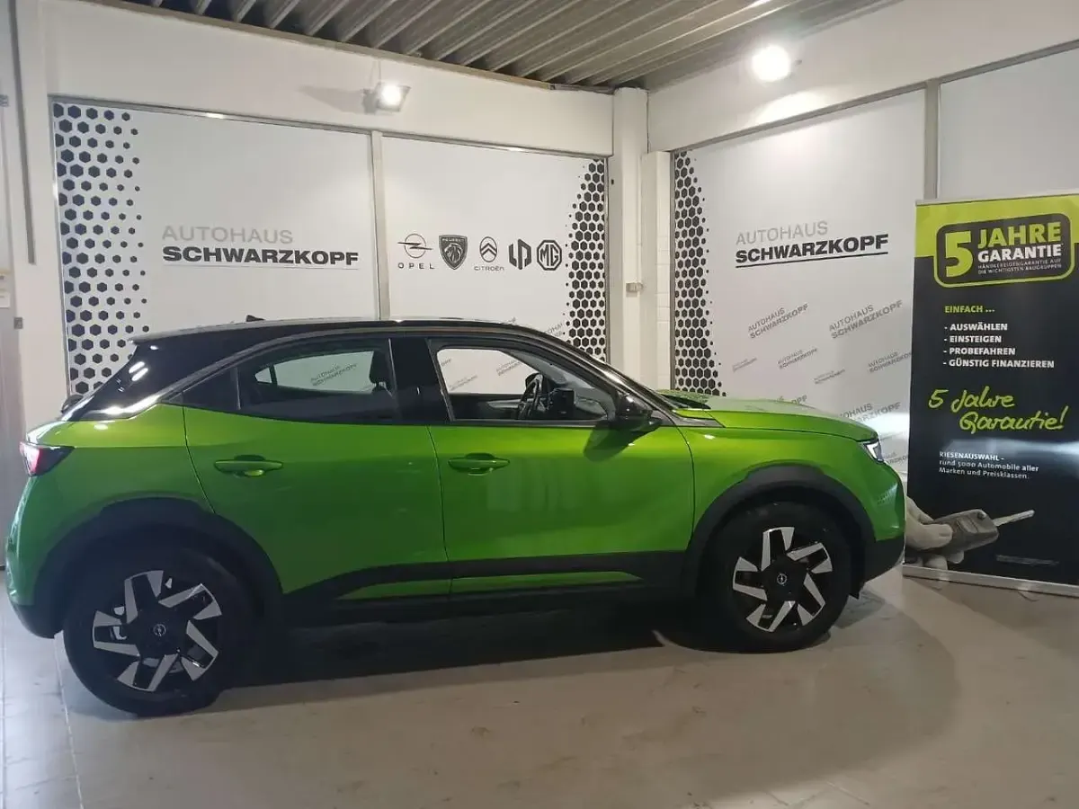 Gebraucht Opel Mokka-e Elegance 100 kW (136 PS) 2023 Matcha green/ikone gruen SUV