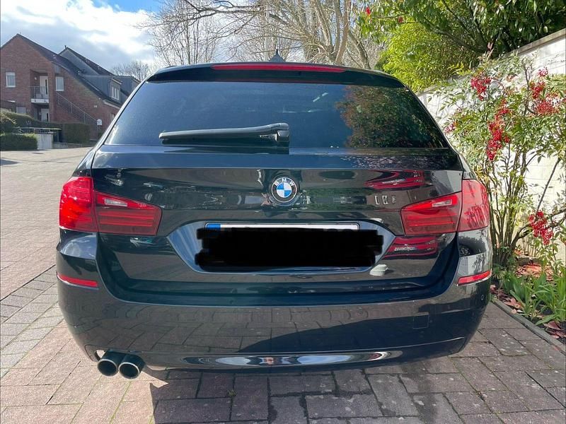 Gebraucht BMW 520 Sport Line 184 PS (135 kW) 2014 Schwarz Kombi