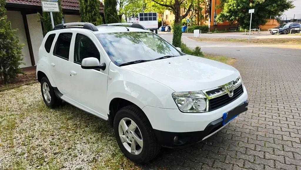 Używany Dacia Duster Prestige 105 KM (77 kW) 2012 Biały SUV