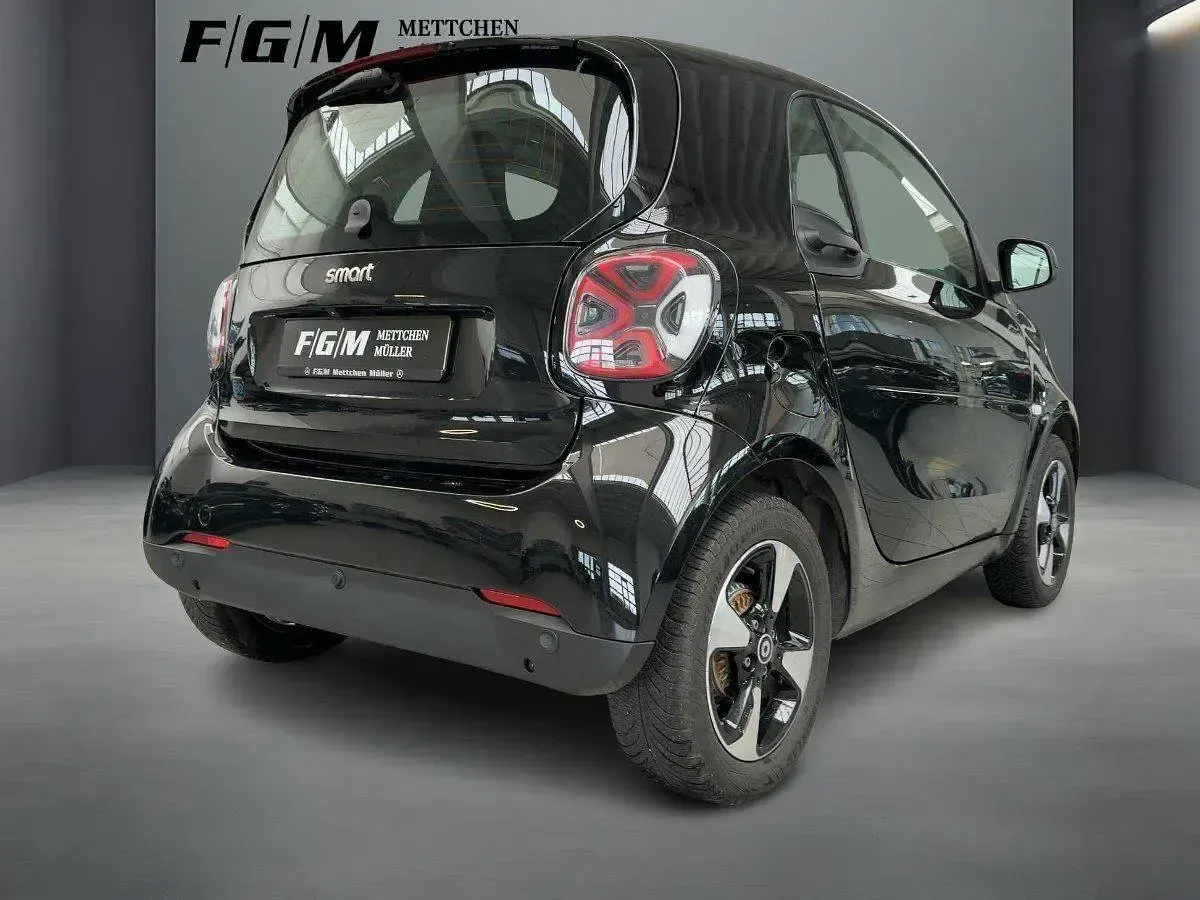 Gebraucht Smart ForTwo Coupé 60 kW (82 PS) 2023 Bodypanels in black Kleinwagen