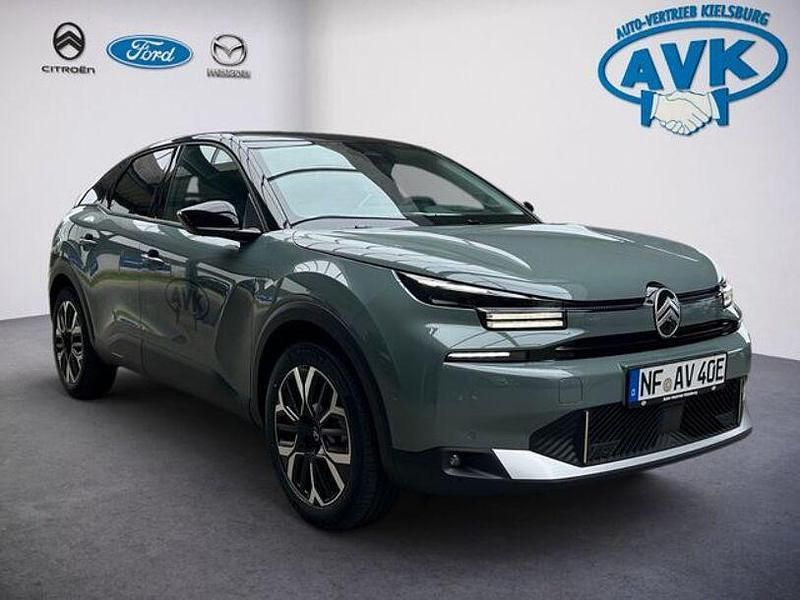 Grün Gebraucht 2025 Citroën e-C4 Limousine | 31.990 € (Superpreis) - Bild 1/4