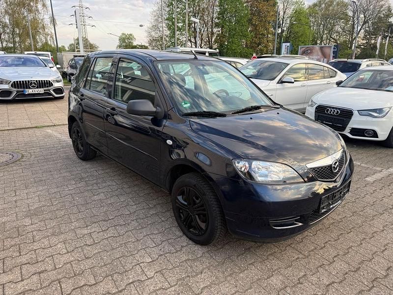 Używany Mazda 2 Comfort 75 KM (55 kW) 2005 Czarny Hatchback