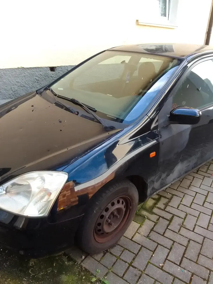 Käytetty Honda Civic 90 HP (66 kW) 2003 Musta Sedan