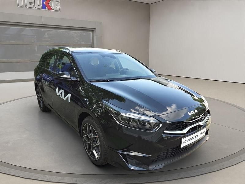 (1k) black pearl m Gebraucht 2024 Kia Ceed Sportswagon 2 Kombi | 27.390 € (Fairer Preis) - Bild 1/4