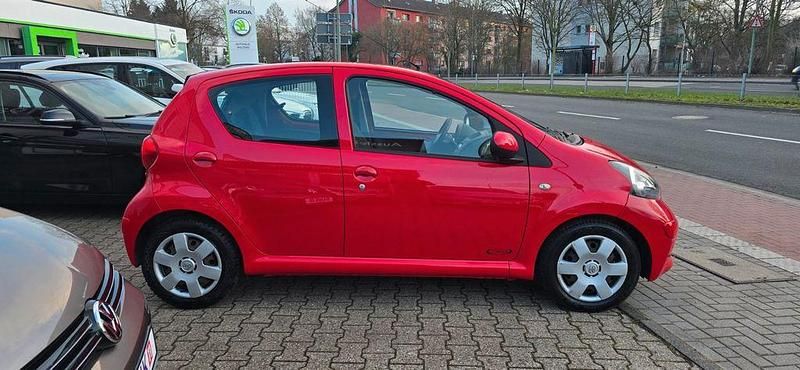 Gebraucht Toyota Aygo Cool 68 PS (50 kW) 2007 Rot Kleinwagen