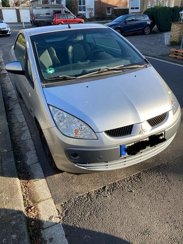 Second-hand Mitsubishi Colt 80 CP (58 kW) 2007 Argintiu Cabrio