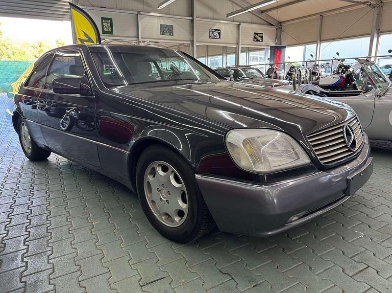 Blauschwarz metallic 199u Gebraucht 1993 Mercedes 500 Coupé | 16.900 € - Bild 1/4