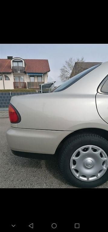 Gebraucht Mazda 323S 88 PS (64 kW) 1996 Beige Limousine