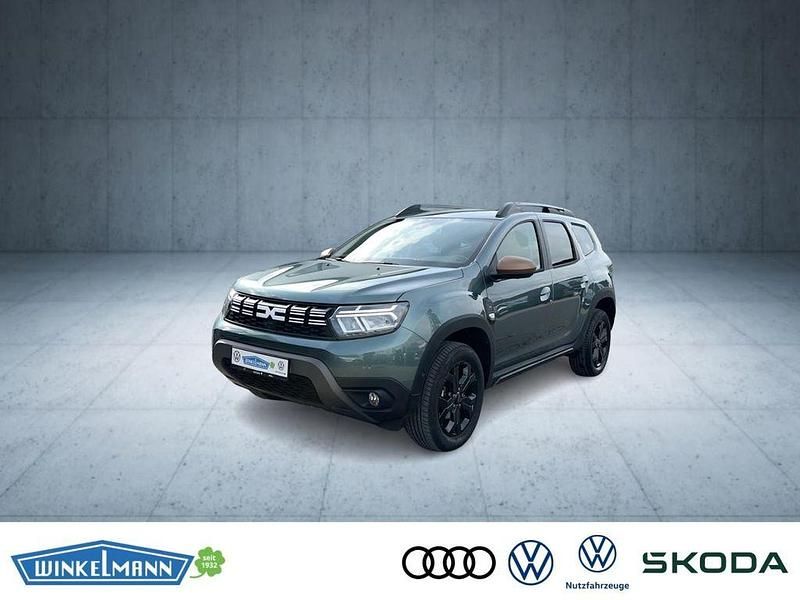 Grau Gebraucht 2023 Dacia Duster Comfort SUV | 16.450 € (Superpreis) - Bild 1/4