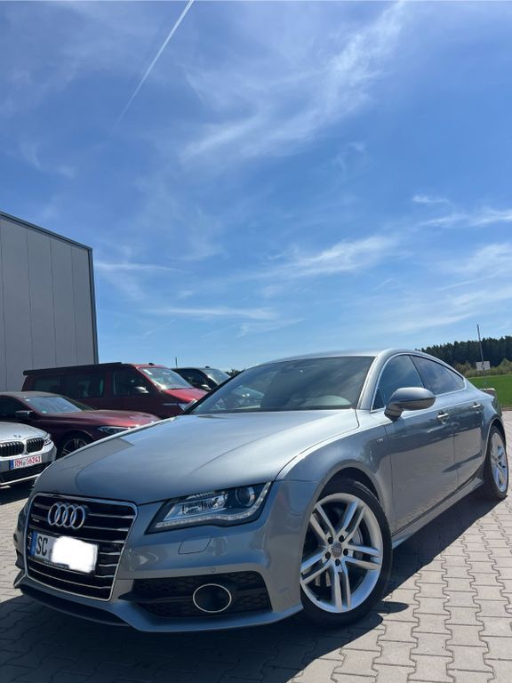 Grau Gebraucht 2013 Audi A7 Sportback Ambiente Kleinwagen | 21.990 € (Etwas zu teuer) - Bild 1/4