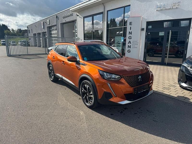 Orange Gebraucht 2021 Peugeot e-2008 Allure SUV | 15.400 € (Superpreis) - Bild 1/4
