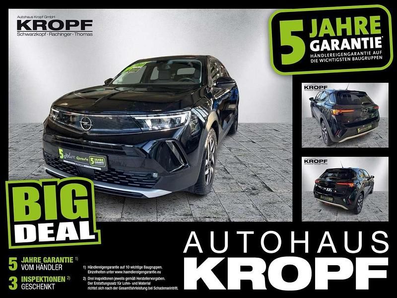 Diamant schwarz/karbon schwarz Gebraucht 2022 Opel Mokka-e Elegance SUV | 18.990 € (Fairer Preis) - Bild 1/4