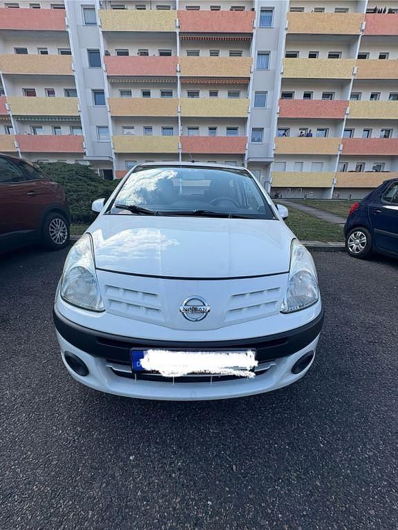 Grau Gebraucht 2009 Nissan Pixo Acenta Kleinwagen | 2.500 € (Fairer Preis) - Bild 1/4