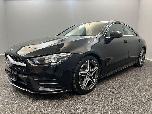 Kosmosschwarz Gebraucht 2020 Mercedes CLA200 AMG line Coupé | 23.999 € - Bild 1/4