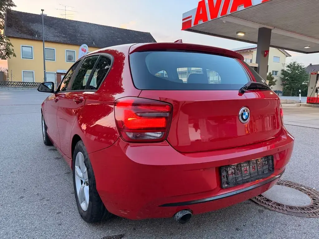 Gebraucht BMW 118 Sport Line 143 PS (105 kW) 2012 Rot Kleinwagen