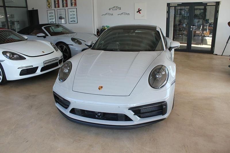 Grau Neu 2025 Porsche 911 Carrera 4 GTS | 126.911 € - Bild 1/4