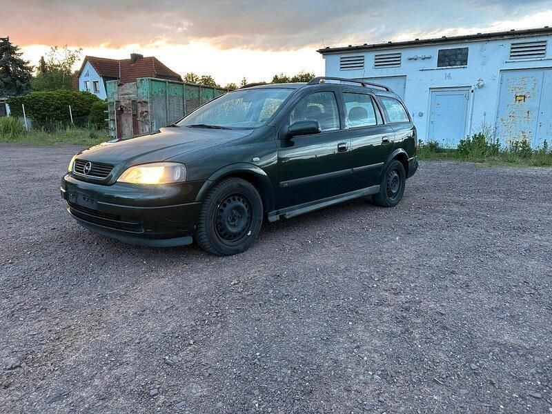 Grün Gebraucht 2004 Opel Astra Kombi | 1.000 € (Etwas zu teuer) - Bild 1/4