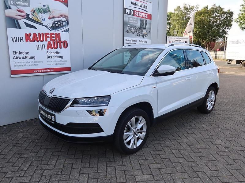 Weiß metallic Gebraucht 2019 Skoda Karoq SUV | 24.700 € (Fairer Preis) - Bild 1/4
