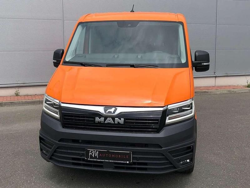 Używany MAN TGE 177 KM (130 kW) 2024 Pomarańczowy Van