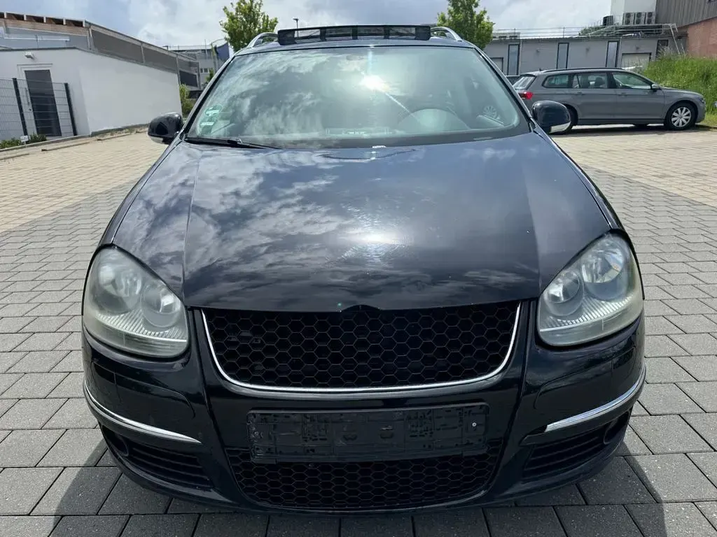 Second-hand VW Golf VI Sportline 122 CP (89 kW) 2009 Negru Hatchback