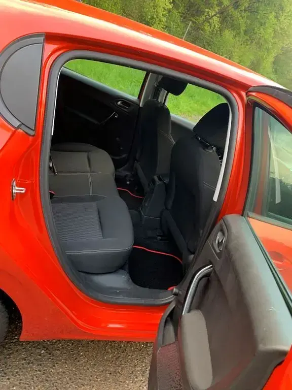 Gebraucht Peugeot 208 83 PS (61 kW) 2019 Orange Kleinwagen