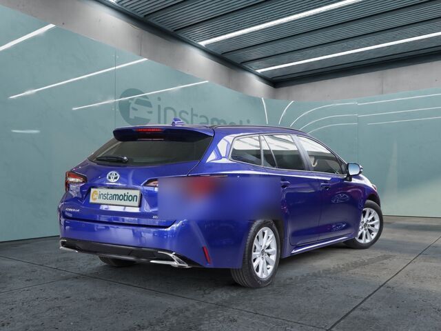Gebraucht Toyota Corolla 98 PS (72 kW) 2023 Blau Van / Kleinbus