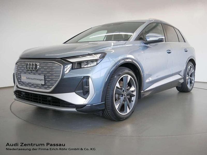 Geysirblau metallic Gebraucht 2022 Audi Q4 e-tron S-Line SUV | 32.590 € - Bild 1/4