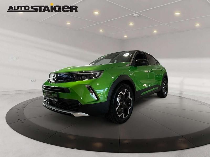 Matcha green Gebraucht 2022 Opel Mokka-e Ultimate SUV | 18.990 € (Fairer Preis) - Bild 1/4