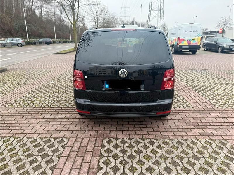 Gebraucht VW Touran 105 PS (77 kW) 2009 Schwarz Van / Kleinbus