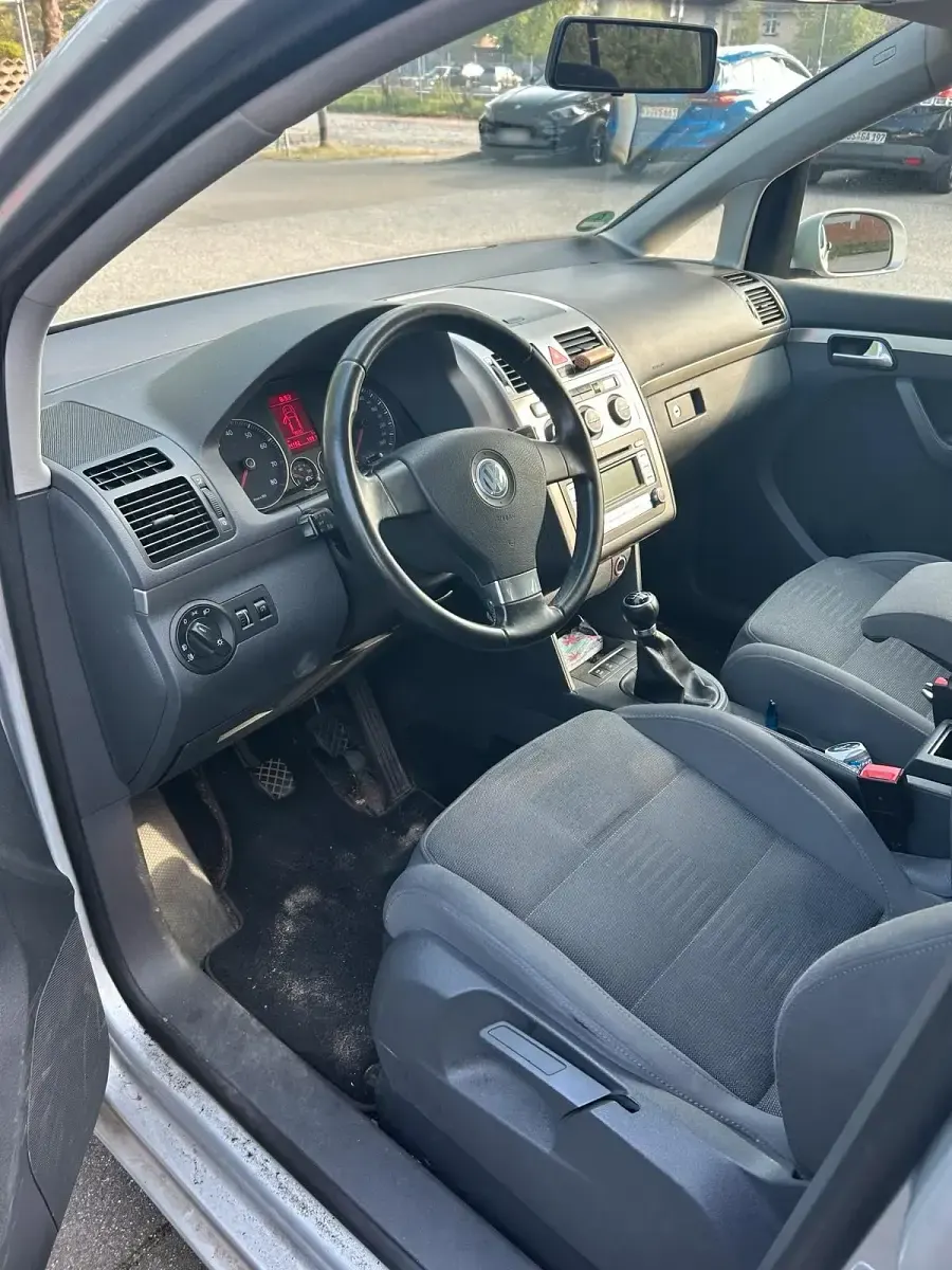 Używany VW Touran Pro 109 KM (80 kW) 2007 Srebrny Minivan