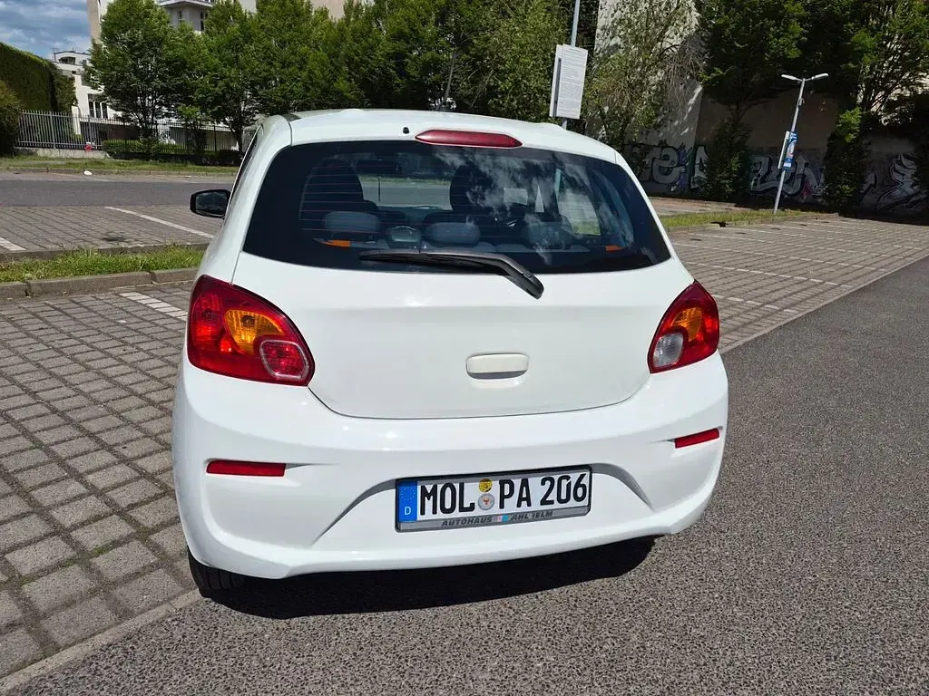Gebraucht Mitsubishi Space Star 71 PS (52 kW) 2016 Weiß Kleinwagen