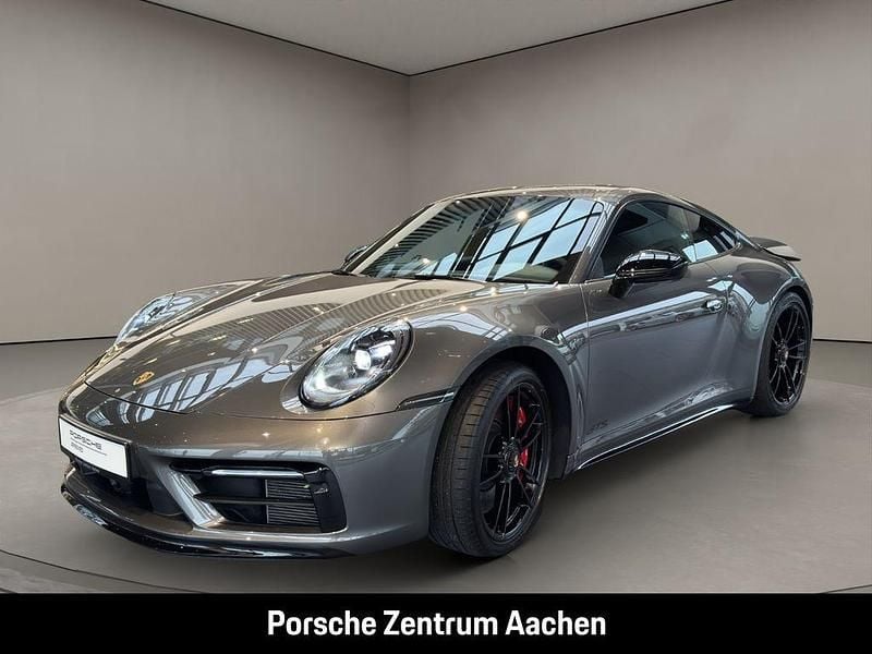 Grau Gebraucht 2024 Porsche 911 Carrera 4 GTS Coupé | 165.400 € (Teuer) - Bild 1/4