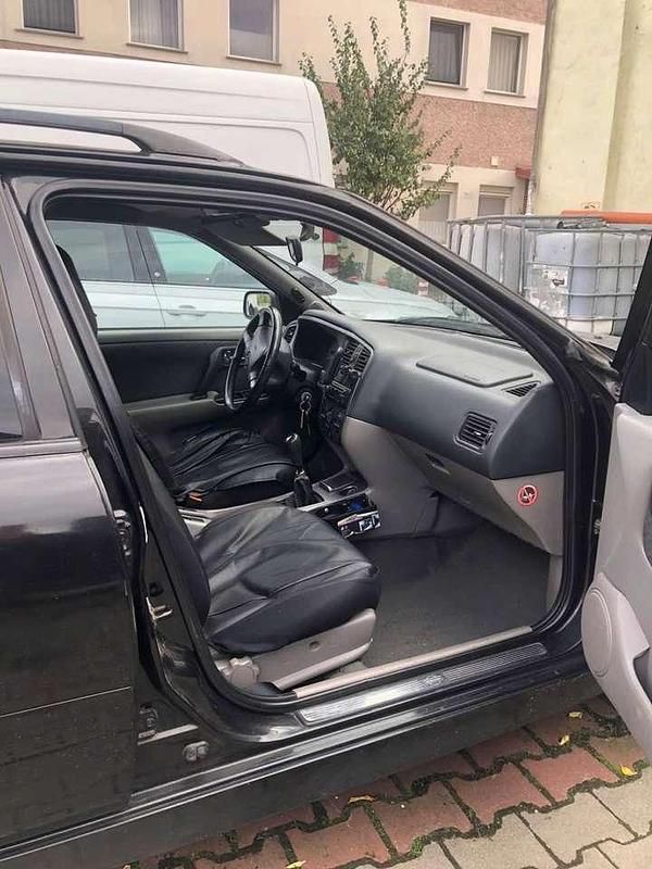 Gebraucht Nissan Primera 114 PS (83 kW) 2001 Schwarz Kombi