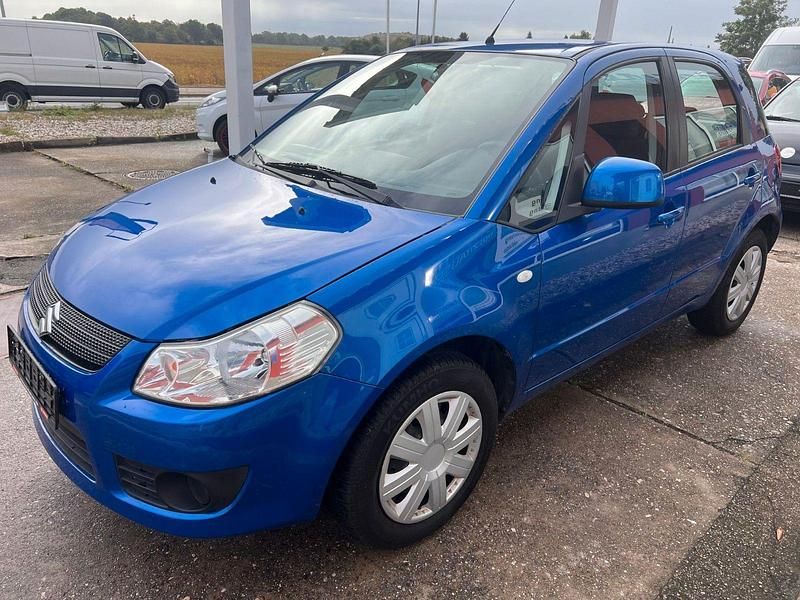 Blau Gebraucht 2009 Suzuki SX4 Comfort Kleinwagen | 6.900 € (Fairer Preis) - Bild 1/4