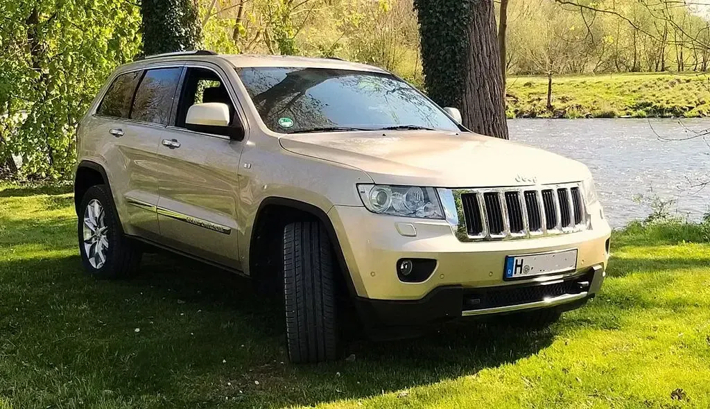 Gebraucht Jeep Grand Cherokee 241 PS (177 kW) 2013 Gold SUV