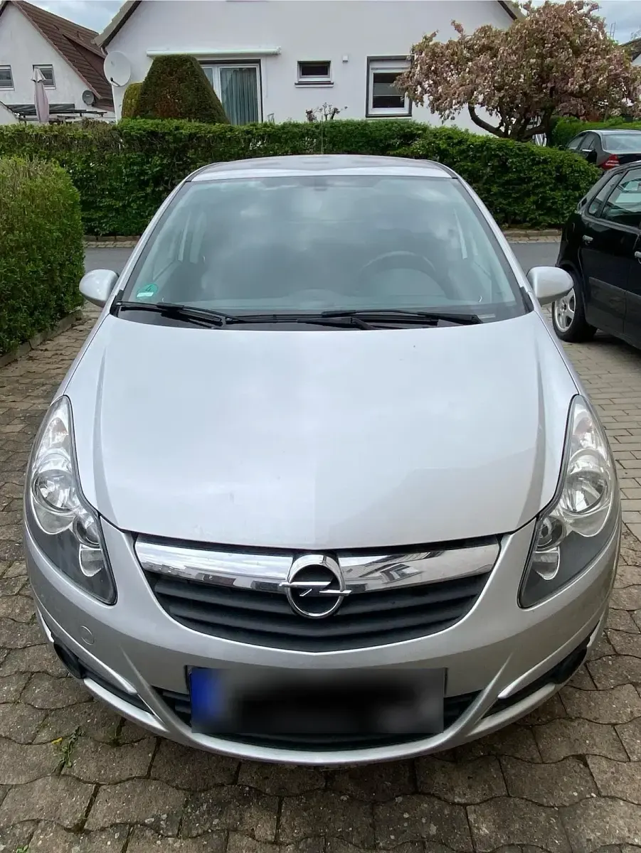 Second-hand Opel Corsa 70 CP (51 kW) 2010 Argintiu Hatchback