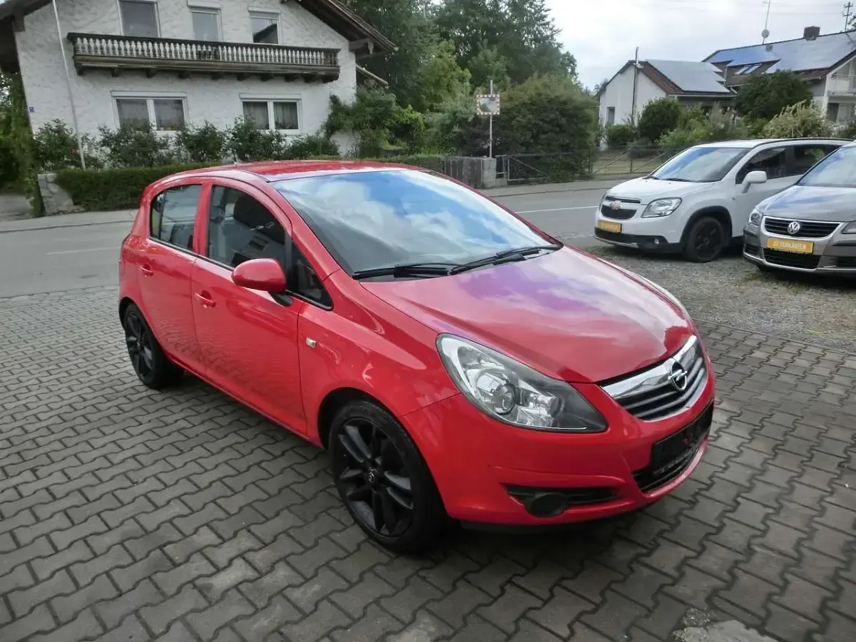 Gebraucht Opel Corsa Basis 60 PS (44 kW) 2009 Magma rot (b) Kleinwagen
