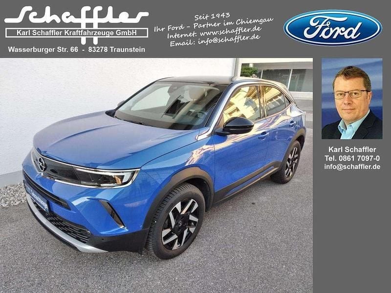 Lackierung voltaic blue met/ty Gebraucht 2023 Opel Mokka Elegance SUV | 21.990 € (Fairer Preis) - Bild 1/4
