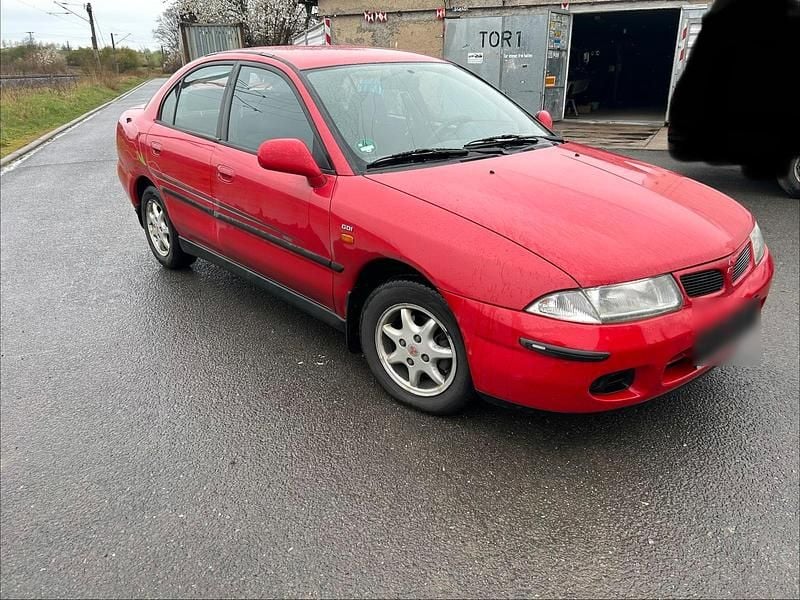 Gebraucht Mitsubishi Carisma 125 PS (91 kW) 1998 Rot Limousine