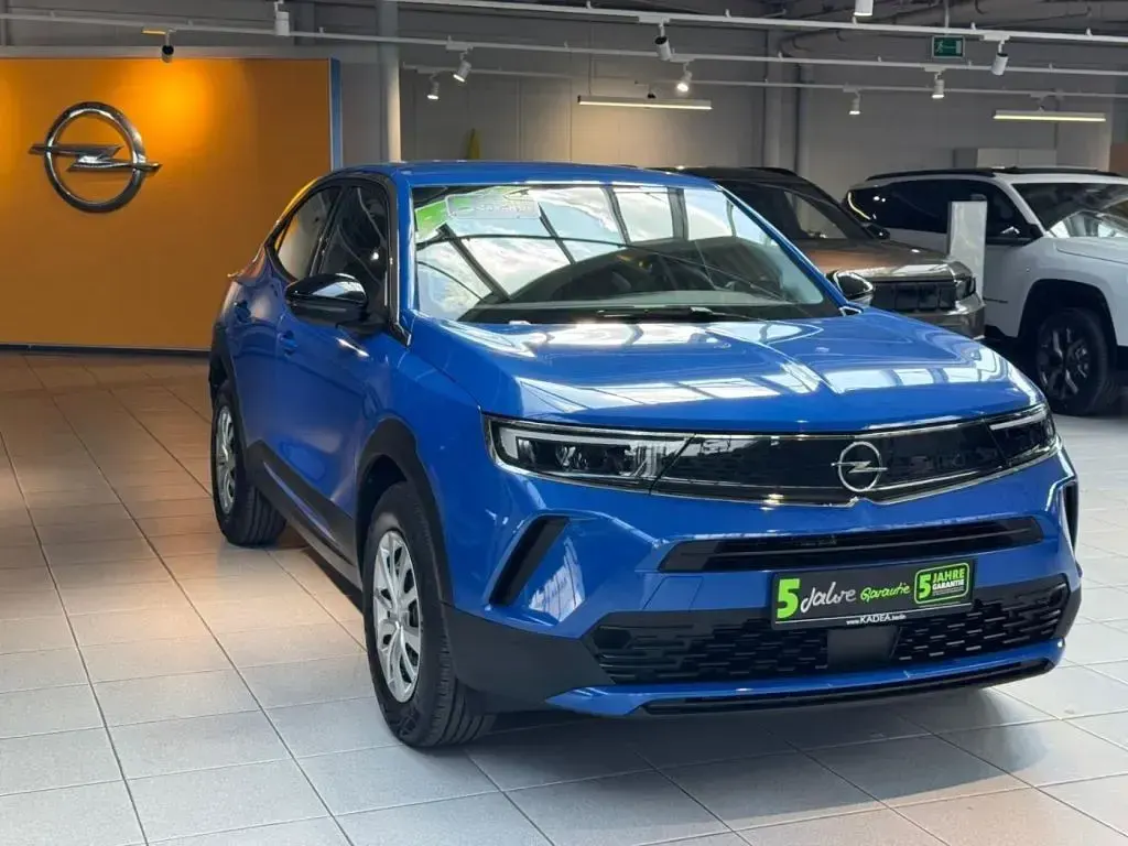 Gebraucht Opel Mokka 130 PS (95 kW) 2022 Perl blau/voltaik blau (metallic) SUV