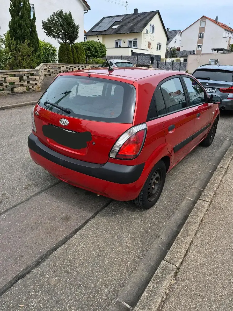 Używany Kia Rio 94 KM (69 kW) 2009 Czerwony Hatchback