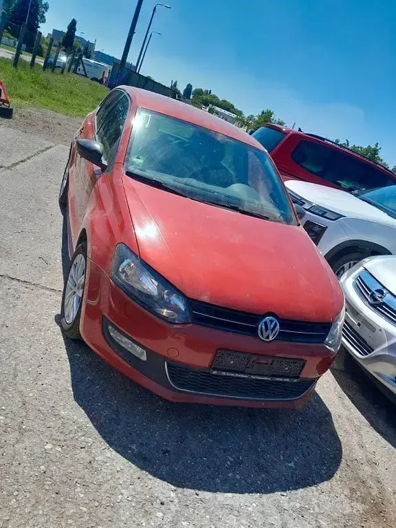 Käytetty VW Polo Style 90 HP (66 kW) 2011 Oranssi Viistoperä