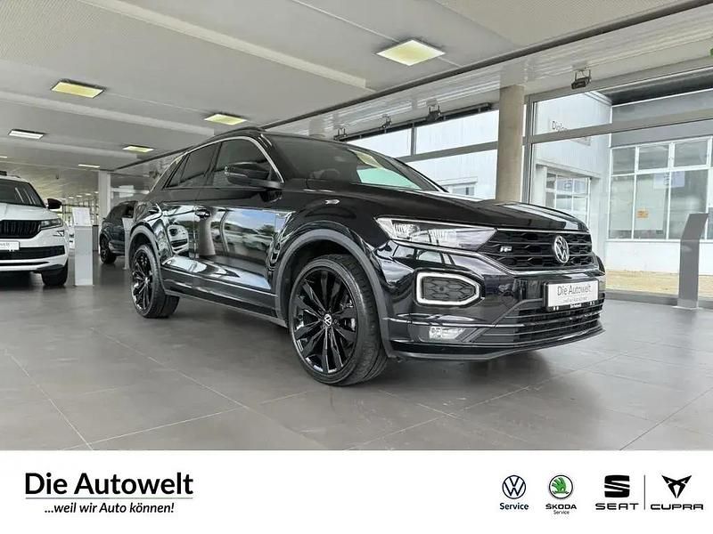 Deep black perleffekt (schwarz) Gebraucht 2021 VW T-Roc Sportline SUV | 22.980 € (Fairer Preis) - Bild 1/4