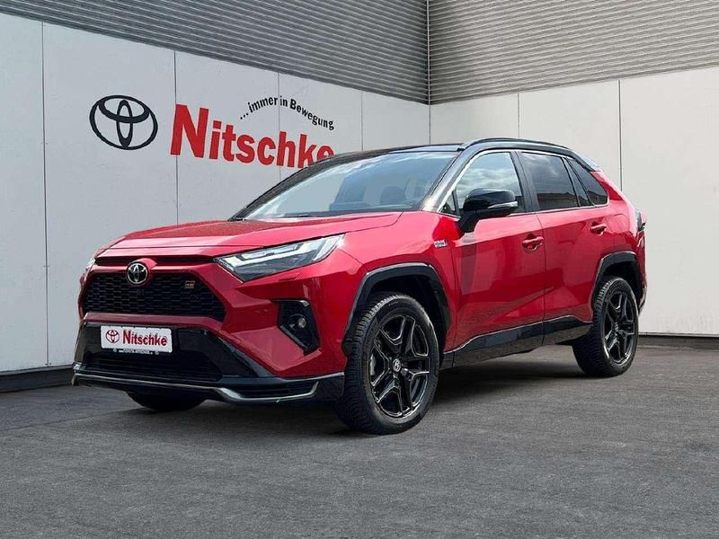 Karminarot metallic Gebraucht 2024 Toyota RAV4 Hybrid Sport SUV | 55.990 € - Bild 1/4