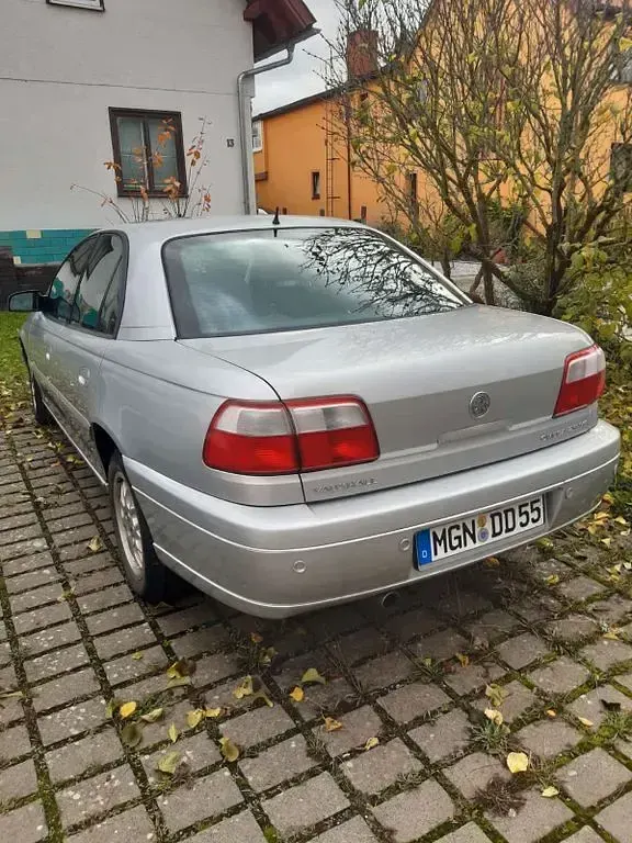 Second-hand Opel Omega 218 CP (160 kW) 2002 Argintiu Berlinǎ