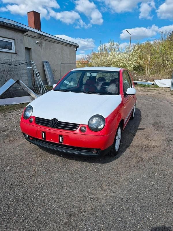 Używany VW Lupo 50 KM (36 kW) 1999 Czerwony Hatchback