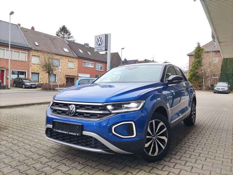 Ravennablau metallic Gebraucht 2024 VW T-Roc IQ Drive SUV | 30.900 € (Fairer Preis) - Bild 1/4